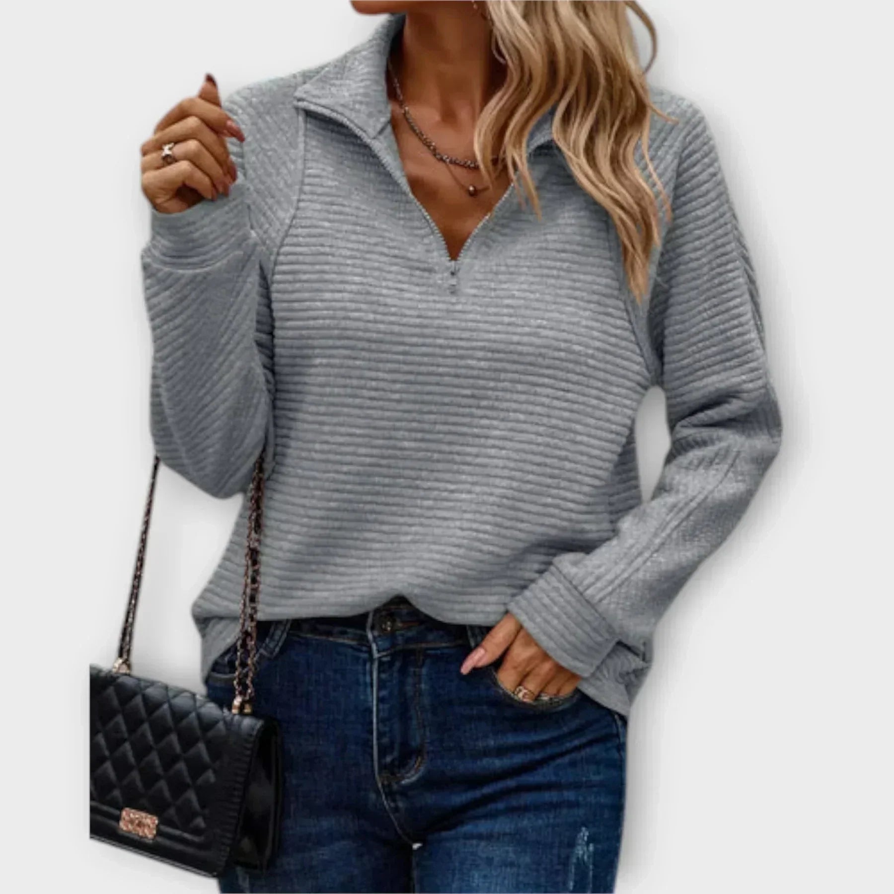 Olivia - Svetr s polo zipem" could be rewritten as "Olivia - Polo Zip Sweater.
